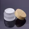 5g-50g Botella de crema de vidrio escarchado con recipiente redondo de madera Tarro Tapa de plástico de grano para el cuidado de la piel Olla cosmética Sombra de ojos Envases de crema facial YF0072
