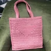 Sacs de plage Designer 2022 Digner Femelle brodée femelle Hollow Rafia Straw Tote Brand de luxe Brands à main tissé d'été luxueux