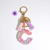 Engelska A-Z-alfabetet bokstäver Key Chain med TASSEL Glitter Keychains Inledande harts nyckelringskedjor Handväska hängande bilspegel