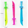 Outdoor-activiteiten Speelgoed Lightsaber Gift Light Up Ninja Swords Motion Sound Flashing Pirate Buccaneer Sword Kids LED Flashing Glow