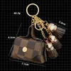 Portachiavi in pelle Anelli Gioielli Fiore marrone Plaid Nappa Portamonete Portachiavi Titolare Mini borsa portaoggetti