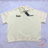 Rhude Demi-boutonné Revers Polo Short Abricot Cordon De Serrage Hommes D'été Casual Survêtement designer t-shirts pour hommes t-shirts de mode pour hommes