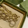 Vintage wisiorty naszyjniki dla mężczyzn designerskie brązowe złotą szyjkę damskie biżuteria luksus g diamond miłość Pearl Party Naszyjnik