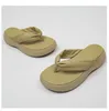 Thick-soled sponge cake sandals and slippers women's summer wear 2022 super-fire stepping on shit bread toe flip-flops beach sho