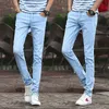 Pantaloni slim-fit da uomo di jeans elasticizzati primaverili e autunnali 2021 Nuovi pantaloni in denim per adolescenti da uomo casual coreani