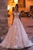 Maniche ad aletta trasparenti Abiti da sposa in pizzo A Line Tulle Applique Schiena bassa Sweep Train Abiti da sposa da sposa abiti da sposa con bottoni BC11133