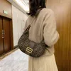 Nova moda coreana clube impressão textura retro saco nas axilas versátil um ombro saco do mensageiro 70% designer tomada venda