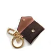 Luxury designer Keychain Keyring Fashion Purse Pendant Car Chain Charm Brown Flower Mini Bag Trinket Gifts Accessories306m