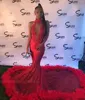 Sexy Red Feather Mermaid 2K19 Prom Dresses 2022 Backless Halter Vintage Lace Plus Size Black Girls Abito da sera formale arabo africano
