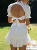 Foridol Sexy Backless Lace Up Abito estivo in pizzo bianco Vestido Donna Ruffles Colletto alla coreana Mini Beach Holiday Dress Scava fuori 220511