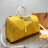 Unissex Crossbody Fashion Airport Package Bolsas de ombro Designer Couro amarelo Bolsas de letra branca