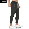 Vovint Nuevos deportes Jogger Pantalones para hombre Pantalones de chándal flacos Algodón Ropa deportiva Pantalones Masculino Gimnasio Fitness Correr Entrenamiento Pantalones de pista 201118