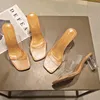 Zapatillas 2022 Toboganes de diseñador Mujeres de 9 cm de altura Mulas transparentes Fetiche Sandalias de cristal femenino Zapatos de bloqueo