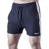 Pantaloncini sportivi da corsa da uomo casual pantaloncini fitness estivi ad asciugatura rapida tinta unita pantaloncini da jogging fitness da uomo 220526