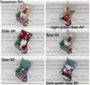 Stock Christmas Cartoon Cholping Santa Claus Snowman Elk Rismes Nop Candy Gift Socks Bag Festivat