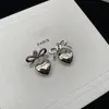 Designer Bow Tie Silverörhängen Stud för kvinnors guldörhänge Fashion Luxury örhängen smycken Kvinnor Mens Hoop Earring 2208082d