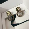 2022 Fashion Lion Head Stud Chic Colored Pendant Boucles d'oreilles Charmand Designer Tiger Head Letter Crystal Studs Femmes Eartrop Luxur Juive8876441