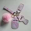 5 Stück/Set Neopren-Armband-Schlüsselanhänger, Pompom-Händedesinfektionsmittel, Handgelenkschlaufe, Lippenstift-Schlüsselanhänger, silberner Schlüsselanhänger für Frauen, 18 Farben