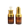 Flacone per pipetta per olio essenziale in vetro marrone trasparente da 30 ml Top bianco Collare in oro argento Coperchio Contagocce Vuoto Rotondo Imballaggio cosmetico Contenitore per fiale riutilizzabili