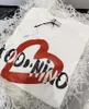 T-shirt con lettera graffiti per bambini T-shirt con paillettes moda cuore ragazze ragazzi cotone manica corta T-shirt estate Designer bambini vestiti larghi top taglia 100-140 cm