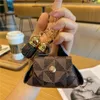 Leather Key Chains Rings Jewelry Brown Flower Plaid Tassel Coin Purse Keyrings Pendant Fashion Mini Storage Bag Charm Keychains Accessories