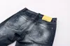 Nowe przybysze D2 męskie luksusowe designer dżinsy dołki spodnie dsq motocyklowe spodnie męskie odzież A383