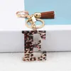 Leopard Print harts 26 Engelska Alfabet Keychains Tassel Key Holder Women Handbag Charms Tillbeh￶r Pendant Keyrings Gifts