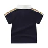 Baby Polo T Shirt Designer Bambini Maniche corte Baby Polo Camicie Ragazzi Top Ricamo Ragazza Cotone Nero Bianco Vestiti 90-130 cm