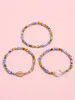 S2973 Bohemina Fili di gioielli di moda Coloful Personalità a forma di perline di vetro Set di braccialetti di conchiglie di metallo Bracciali di perline di perle finte 3 pezzi / set