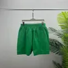Été nouveaux hommes Shorts Designer Design mode Triangle lettre imprimer décontracté Shorts amples vacances Shorts de plage