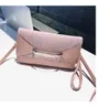Hot Selling New Dign Pu Leather Envelope Msenger Bag latt ladi mode unik kopplingsväska för flickor
