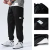 Herenbroek lente zomer mannen modekleur straalden rechte lading trend multi -pocket joggers joggers jogs -40men's drak22