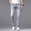 Jeans pour hommes, petits pieds, Slim, marque de mode, diffusion en direct, gris clair, pantalon polyvalent délavé