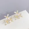 S925 zilveren naald microset zirkoonschaal madeliefje bloembladen oorbellen vrouwen Koreaans vergulde 18k gouden hoogwaardige oorbellen cadeau sieraden