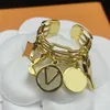 Luksusowe projektanci dzwonią na imprezę imprezową prezent mody biżuteria kluczowe złote pierścienie zaciągnięcia dla kobiet miłosnych pierścień liter kwiatowy marka wysokiej jakości