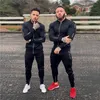 Agasalhos masculinos Conjuntos masculinos de treino de poliéster Slim Fit Sweatsuits masculinos Conjuntos de corrida Casacos e calças para