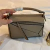 Modische kleine Puzzle-Umhängetasche für Damen aus klassischem Kalbsleder, Designer-Mode-Clutch-Handtaschen