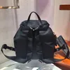 2022 borsa MINI stile classico di alta qualità Re-Nylon Zaini esterni Funzionalità Multi-tasche Chiusura con coulisse prad Universale carino Multiuso C6AN #