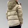 Parka in piumino da uomo Doudoune invernale da uomo e piumino beige Parka stile britannico ispessito caldo cappotti da lavoro con cappuccio per il tempo libero