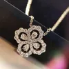 Luxury full diamond four grass pendant necklace niche design super flash imitation Moissanite flower-shaped flower clavicle chain female