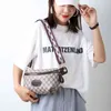 Bolso de pecho con bola de masa de cintura versátil de verano a la moda para niña Saddle283x