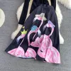 2022 Automne Winter Pisse Robe Two Piece Femme Femme tricotée Pull noir + robe de bal à taille haute florale