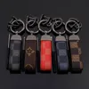 Luxury Key Chain Rings for Men Women Design Key Fob Buckle Fashion Genuine Leather Keychain Holder Car Keyrings Accessories Bag Charm Gifts