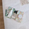 Portamonete in cotone con stampa floreale fresca Portamonete a mano Piccola borsa in tessuto Borsa per cuffie Borsa cosmetica da viaggio Borsa per il trucco