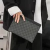Wallet Fashion Simple Leather iPad Hand Bag Business Leisure Envelope عالية السعة الكورية من الرجال
