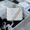 Venta al por mayor 22s más nuevo Nuevo bolso de cubo Bolso de hombro elegante y retro Bolsos de compras con cadena de letras de diseñador Cartera de cuero de lujo