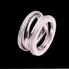 Anéis de casamento de casal fashion para homens e mulheres, marca clássica, designer oco, anel de diamante, anel de aço inoxidável 316L de alta qualidade, presente de joias