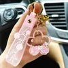 Creative Oil Sakura Flower KeyChain Women Liquid Sequin Keyring Charm Bag Car Pendant Key Chain for Kids Gift