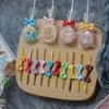 Cadeau cadeau 100pcs coloré soie noeud noeud fil d'étanchéité West Point Lollipop Biscuit sac emballage cravate bonbons chocolat accessoires cadeau