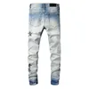 Jeans amirrs designer t shirts 2023 jean casual hip hop slitna ut och tvättade stänk bläck färg målning smal passform herr axcs